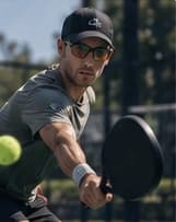 Pickleball player in action from the approved VCN mockup